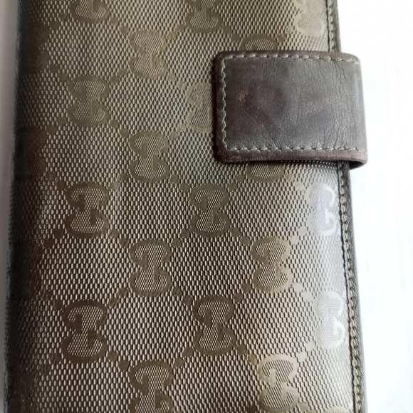 Authentic Gucci Metallic brown Signature wallet with GG charm - Picture 15 of 16